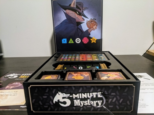 The box, the insert, the manual for 5 Minute Mystery.